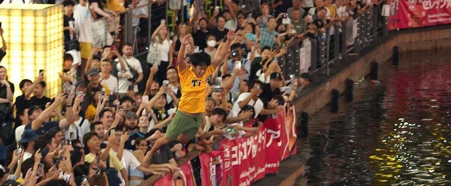 Tigers' Triumph Sparks Dotonbori Diving Deluge