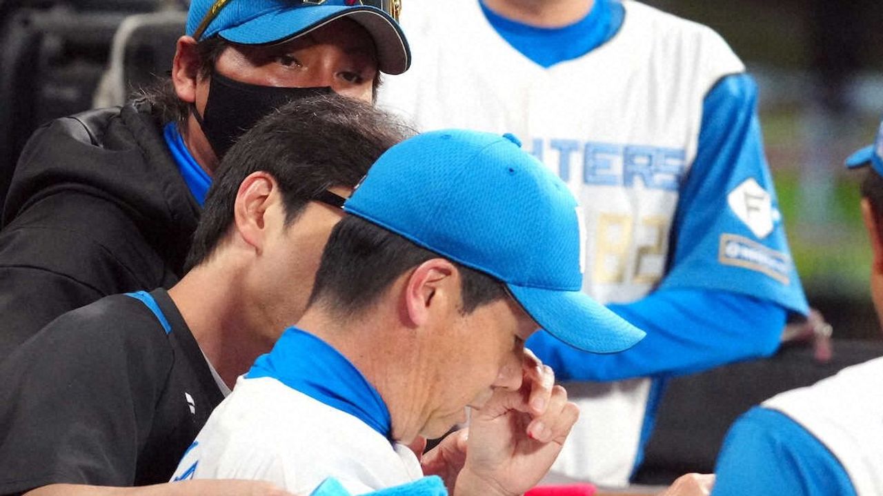 Unexpected Strike: Nippon-Ham Fighters' Coach Hospitalized After Batting Accident